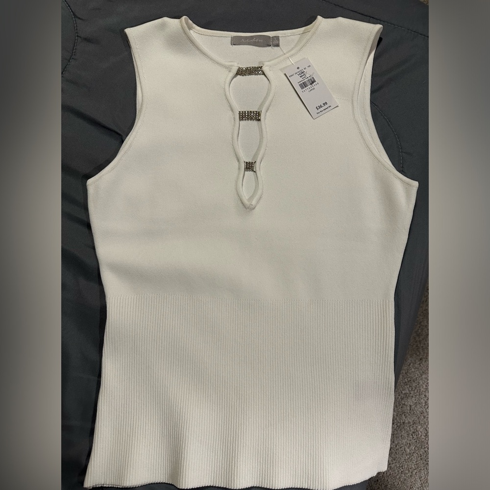 NWT fitted top. Size large
